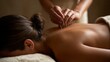 © kanesuan - Relaxing Acupuncture Treatment on a Woman's Back in Wellness Setting
