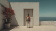 © alap - Young traveler stands before a closed entrance on a sunlit balcony overlooking the ocean