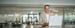 © insta_photos - Happy mature bank manager looking at camera in office. Middle aged professional business man executive financial investor leader using laptop computer working sitting at desk. Portrait. Copy space.