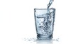 © Zeenat - Fresh water pouring into a clear glass on white background