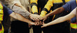 © ฺฺฺBoonterm - Team multi-ethnic workers, men and women, join hands to join forces to join forces to work for the industry for success. Teamwork and professional colleagues : Workers' hands, teamwork concept.