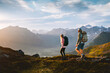 © EVERST - Couple hiking in Norway man and woman travel together in Lofoten islands, friends on active summer vacation healthy lifestyle family trekking outdoor adventure backpacking trip eco tourism