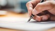 © PhotoVerse - Close-up of a person's hand writing with a fountain pen on an official document