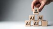 © Najmin - A hand placing a block with a human silhouette on top of a stack of ai blocks