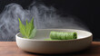 © Igor - Green Vegetable Roll with Steam in White Bowl