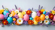© Mahmuda - Vibrant easter eggs and flowers arrangement for springtime celebrations