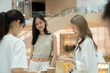 © Nazareno - Young asian women enjoying shopping and browsing in modern department store