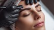 © Olsek - Beauty treatment in a salon as a professional brow artist shapes and enhances eyebrows for a client with relaxing ambiance. Generative AI