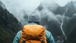 © Larisa AI - A lone adventurer stands before towering mountains, surrounded by mist and rain, lost in the beauty of nature and the quest for adventure in the great outdoors.