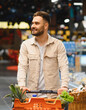 © Serhii - Happy man shopping for healthy food in supermarket
