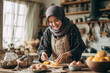 © aldi - A woman in a classic kitchen is preparing cake dough on the table.