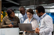 © DC Studio - Engineering team in Silicon Valley company office developing software apps with laptop. Teamworking colleagues using notebook at work to code, debugging applications to resolve issues