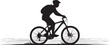 © Pro stocker - Dynamic silhouette of a mountain biker with a helmet and backpack, actively riding a bicycle on an outdoor trail, conveying adventure, sport, and a healthy, energetic lifestyle.