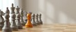 © Yuliia - Orange chess pawn standing out among white pieces on wooden board, symbolizing leadership, uniqueness and strategic thinking in business concepts.