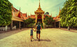 © avtk - Father and son visiting Wat Hua Lamphong, Buddhist temple in Bangkok, Thailand.