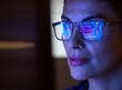 © Westend61 - Woman with computer chip reflection in glasses representing artificial intelligence