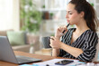 © PheelingsMedia - Self employed thinking about job working at home