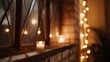 © Thares2020 - A single lit candle on a ill casts a warm glow with bokeh lights in the background