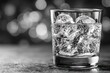 © whitestorm - A refreshing glass of ice water with a bokeh background creates a soothing, hydrating, cool and invigorating drink, perfect for quenching thirst on a hot day.