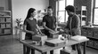 © Alex - Modern small business teamwork around packaging table in bright studio, ideal for commercial projects.