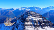 © Drones Sauvages - Aerial drone view of Tour Salliere peak with Mont Blanc mountain in the distance, dramatic alpine landscape above Lac d’Emosson in the Swiss Alps