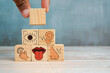 © Akmalism Photography - Sixth sense concept with wooden blocks showing five human senses and an extra cube representing intuition and perception.