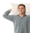 © New Africa - Man in stylish pyjamas with pillow on white background