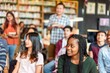 © Rawpixel.com - Diverse students engaged in learning.