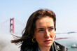 © Rawpixel.com - Freckled woman near bridge