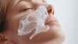 © Kessel - Sleep Apnea Conceptual Image of a Woman Wearing a Futuristic Transparent Nasal Mask for Respiratory Therapy and Wellness