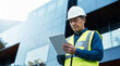 © kayden - This software help me to keep track of everything. Shot of a engineer using a digital tablet on a construction site.