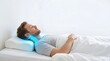 © Flash memory - Man sleeping on orthopedic pillow with highlighted spine. Neck support concept for proper posture for health and good sleep.