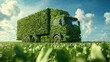 © saichon - Eco friendly truck covered with green leaves driving through lush field under bright blue sky with clouds, symbolizing sustainable transport