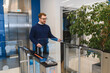 © Serhii - Employee accessing secure office building turnstile system