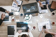 © InfiniteFlow - Collaborative Business Meeting Focusing on Skill Development with Digital Tools and Analytics Imagery in a Modern Office Setting Quark.
