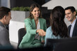 © fizkes - Supportive female business coach shake hands with office worker on corporate team training motivating professional growth approving progress appreciating contribution to collaborative problem solving