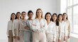 © good - A diverse group of professional women pose confidently, dressed in neutral-toned business attire