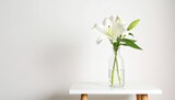 Elegant white lily flower displayed beautifully in clear glass vase centerpiece