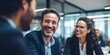 © kwanchaift - Smiling professionals engaging in a lively discussion during a meeting in a modern office setting, highlighting teamwork and collaboration among colleagues