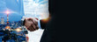 © lukai - wide banner. multi exposure image of investor business man handshake with partner for successful meeting deal with during sunrise and cityscape background, investment, partnership, teamwork concept
