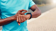 © peopleimages.com - Hands, smart watch and timer for runner in summer, click and check map for direction in morning. Person, exercise and iot clock with stopwatch on application for fitness, heart rate and wellness