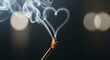 © yeyen - Burning Matchstick with Heart Shaped Smoke.
