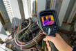 © JD Studio - Thermal camera supports electrical safety inspection inside a control cabinet, revealing heat anomalies in cable connections and wiring to improve reliability, diagnostics, and maintenance.