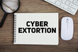 © may1985 - Cyber Extortion message with keyboard and optical mouse on wooden background