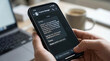 © edojob - Person receiving urgent payment notification by sms on smartphone