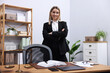 © New Africa - Portrait of notary near wooden desk in office