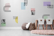 © New Africa - Cozy children's room with furniture and cute wallpaper. Stylish interior