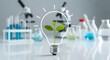 © emwe studio - Glowing lightbulb with green plant inside in a science laboratory representing environmental research and green technology