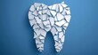 © sornram - A creatively designed tooth made of shattered white pieces on a blue background, symbolizing dental care and oral hygiene.