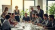 © Ilya - Collaborative Team Meeting on Business Strategy with Engaged Participants in a Modern Office Setting Filled with Natural Light